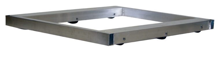 The Vestil Alum Pallet Dolly No Tilt 4K 48 x 48 features a large, square aluminum frame with visible side rivets. Elevated on small wheels, its smooth metallic surface ensures easy maneuverability and durability.