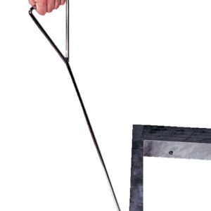 A hand grips a metal hook tool similar to the Vestil Option-Loops/Handles Alum Pallet Dollys sturdy handle, using its triangular grip and long shaft for leverage to lift a manhole lid against a plain white background.