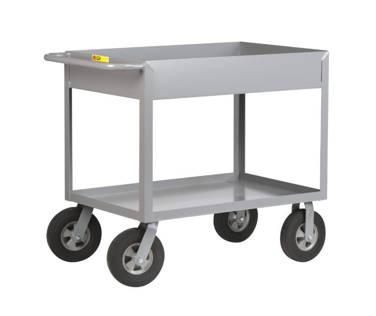 A gray, two-shelf metal utility cart, akin to the Little Giant Cushion Load Deep Shelf Truck, with four black rubber wheels and a maneuvering handle. The raised-edge top shelf ensures items stay secure. Its empty and set against a white background.