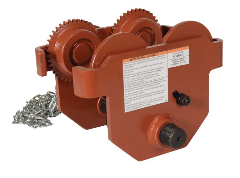 The Vestil Eye Manual Trolley Geared 6K Capacity is a red industrial trolley with wheels and gears for overhead lifting, featuring warnings and specs on its label. A side chain signifies its geared mechanism.