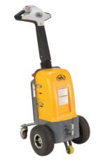 The yellow and gray Vestil Electric Powered Tugger 1K Pull Capacity features a digital control panel on its long black handle, with two large rear wheels and two smaller front caster wheels for easy maneuverability.