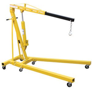 The Vestil Engine Hoist Folding Legs 4K Capacity is yellow and hydraulic, featuring a long extendable arm with a hook and folding legs for compact storage. Mounted on a wheeled base, its perfect for lifting heavy objects in workshops or garages.