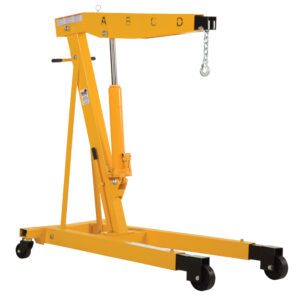 The durable Vestil Engine Hoist features hydraulically adjustable telescopic legs, a boom marked A–D, 6K capacity, and a wheeled design for easy maneuverability. It includes a convenient handle and reliable hook for efficient lifting.