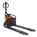 The Vestil Electric Pallet Truck 2.6K 27X48 has a black handle, gray forks, a red emergency stop button, and a side-mounted battery pack, complemented by orange wheels and black safety guards around the battery area for an efficient design.