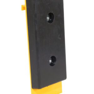 A black rectangular Vestil Fork Truck Carriage Bumper Class II features two circular indentations and is mounted on a yellow stand, likely serving as an industrial protective cover. The yellow stand extends beyond the bumper.