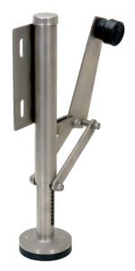 The Vestil Stainless Steel Floor Lock Left Mount features a silver metal design with a cylindrical body, adjustable arm mechanism, and rubber stopper. Its flat base supports left mount installation, and it includes two vertical slots on the side panel for added functionality.