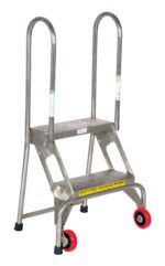 The Vestil Folding 2 Step Ladder W/Wheels Ss is a robust metal ladder featuring two steps, sleek handrails, and front red wheels for easy mobility. It includes a bilingual safety warning in English and Spanish on the bottom step.