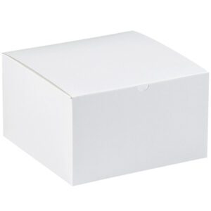 The MH-USA 12 x 12 x 9 White Gift Boxes (50/Case) have a minimalist yet sophisticated design with gently curved tops and crisp edges, set against a clean white background.