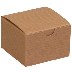 A small, unbranded closed brown cardboard box measuring 3 x 3 x 2 features a smooth surface and a semi-circular tab for opening with a slightly curved lid, ideal for any occasion.