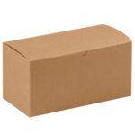 The 9 x 4 1/2 x 4 1/2 Kraft Gift Boxes have a simple rectangular shape with a closed lid and small tab for easy opening. Their plain brown design contrasts well with a white background, making them ideal for versatile gifting needs. They are sold in cases of 100.