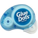 The Dot N Go® Permanent Glue Dots® Dispenser (6/Case) is a sleek blue plastic dispenser with visible white gears and a clear bottom section, designed for efficient adhesive dispensing.