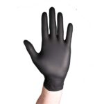 A hand wearing a black glove is shown against a white background, its snug fit outlining the fingers and palm. Ideal for quality control in distilleries, this precision highlights the meticulous attention to detail required in lab renovation services.
