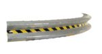 The Vestil Guard Rail Curved Rail Galv 120 In features yellow and black striped hazard tape at the center and has a textured, weathered look. It is set against a white background and slightly elevated.