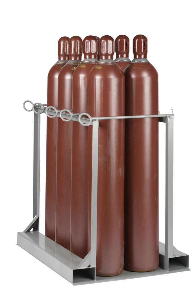 Six large brown gas cylinders are secured in a metal rack on a Little Giant Gas Cylinder Pallet, evenly arranged in two rows of three. Metal rings hold them steady, while the pallets flat base ensures their stability and safety.