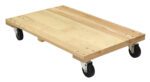 The Vestil Hardwood Dolly-Solid Deck 1.2K Lb 24X36 has a flat rectangular wooden surface and four secured black wheels with metal brackets for stability, made of light-colored wood with visible grain.