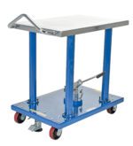 The Vestil Hydraulic Post Table 2K Lb 24 X 36 is a blue hydraulic lift table cart with a silver handle, four caster wheels (two with brakes), and a foot pedal for lifting, featuring a metallic surface and utilitarian design ideal for industrial or warehouse use.