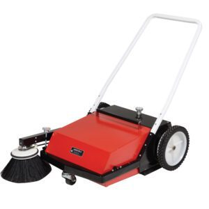 The Vestil Manual Brush Sweeper Belt Driven features a sleek red and black design, a white handle, large black wheels, a rectangular shape, and a rotating side brush for effortless surface cleaning.