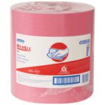 A large roll of pink industrial cleaning wipes branded as Kimberly Clark® WypALL® X80 Red Heavy-Duty Wipers Jumbo Roll (475/Roll) in bold red text on white packaging, featuring an image of hands wiping, indicating a generous supply of sheets.