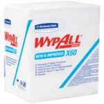 The Kimberly Clark® WypALL® X60 1/4 Fold Industrial Wipers Bulk Pack (912/Case) boasts a white and blue design with New & Improved highlighted, using multilingual descriptions and brand logos to cater to diverse industrial needs.