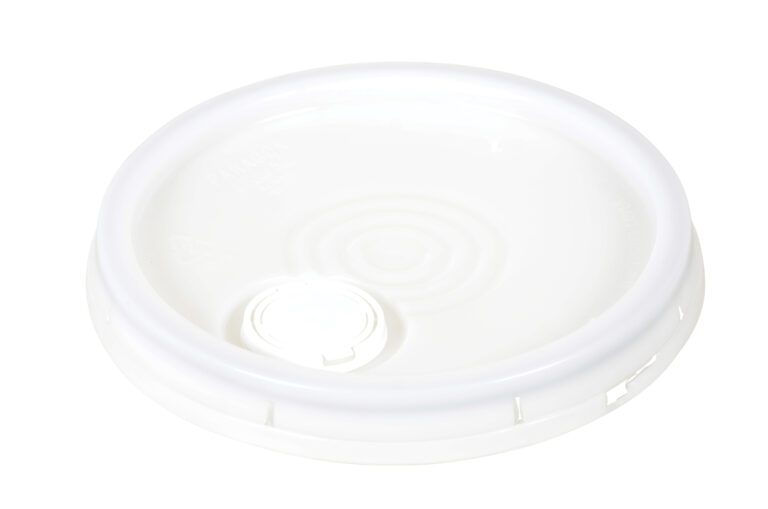 The Vestil Spout-Top Lid-Natural-3.5, designed for 6 Gal containers, is a white circular plastic lid with a small pull-tab opening, displayed on a plain white background. It features raised circular patterns and a slightly textured surface.