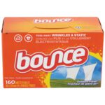 The Bounce® Dryer Sheets - 160 count (6/Case) comes in a bright orange box labeled Toss Away Wrinkles & Static, featuring white clothes on a line with an Outdoor Fresh scent, and includes visible codes and dimensions for convenience.