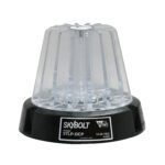 The Vestil Light, a clear round 4 dome with a black base, marked Skybolt, Tri-lite, and model STLP-DCP, is designed for dynamic environments and operates at 12-36 VDC, hinting at industrial or emergency use.