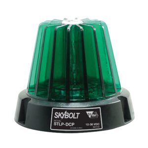 The Vestil Light, a round 4 dome flashing safety beacon, emits a bright green glow and operates at 12-36 VDC. Known as Skybolt, model STLP-DCP, its encased in a protective ribbed cover on a black base with brand and model info.