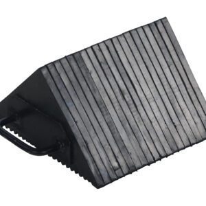 The Vestil Laminated Rubber Wheel Chock With Grips features a ribbed surface and a sturdy metal handle on the side.