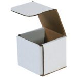 An open MH-USA 3 x 3 x 3 white corrugated mailer from the 50/bundle set, featuring a hinged flap lid and contrasting brown interior, perfectly displays its sleek design.