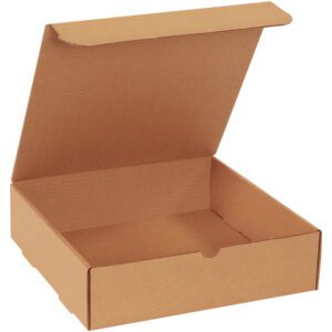 The 12 x 11 3/4 x 3 1/4 Kraft Literature Mailer, sold in bundles of 50, is a brown corrugated cardboard box with a hinged lid. Angled slightly left, it reveals its simple design and efficient storage capability with a partially lifted lid adding intrigue.