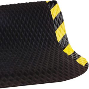 The 3 x 12 Hog Heaven™ Nitrile Mat has a textured black surface with striking diagonal yellow and black stripes along the top edge.