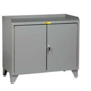 The Little Giant Counter Height Bench Cabinet with Welded Center Shelf is a gray metal unit featuring a flat top, two closed doors, a single handle, small legs, and a warning label above the doors. Its designed for industrial or utility use.