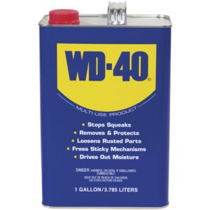 A 1-gallon WD-40 can with a red cap and blue label; its uses include stopping squeaks, removing and protecting, loosening rusted parts, freeing sticky mechanisms, and driving out moisture.