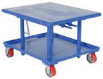 The blue metal Vestil Low Profile Mech Post Table 30 X 36 industrial cart has four red swivel caster wheels, a flat top surface, a lower shelf, sturdy metal legs, and a handle for easy maneuvering.