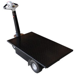 The Vestil Traction Drive Cart Platform 0.75K Lb features a black flatbed design, two large wheels, and a steering handle with intuitive controls. The platform has a diamond plate texture, and the handle is attached to one end of the cart.