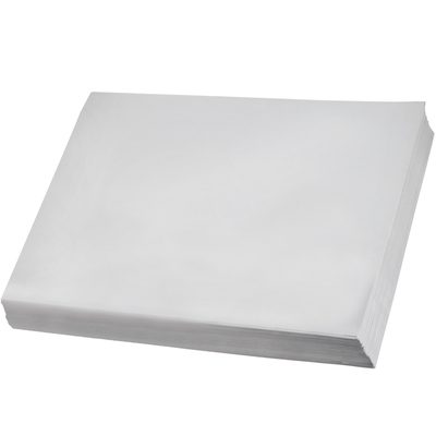 NP243010.jpg A neat stack of MH-USA 24 x 36 - Newsprint Sheets (10 lbs.) (60/Skid) is viewed at an angle, featuring crisp edges and a smooth, clean surface.