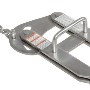 A metallic wheel chock with a chain, featuring two rectangular prongs and handles like the Vestil Cam Action Pallet Puller 5K 3 In Jaw. It has visible safety instruction labels to ensure user safety during operation.