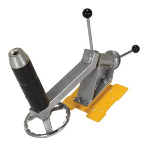 A metal ships wheel and throttle control mechanism akin to the Vestil Quick Lift Reel Rotator Attachment. It has a yellow base, a four-spoke wheel, and a throttle with two black handles, all seemingly crafted for marine utility.