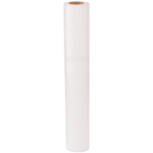 A roll of MH-USA 28 x 17 x 58 - 1 Mil Furniture Covers (275/Roll) stands upright with its cardboard core exposed at the top. The tightly wound clear plastic creates a smooth, shiny surface.