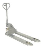 The Vestil Galvanized Steel Pallet Truck 20 X 48 is silver, manually operated, and features a long handle with two forks. Its robust design includes wheels at fork tips for smooth movement and it carries a CE mark for quality assurance.