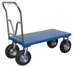 The Vestil Pneumatic Tire Platform Cart 24 x 48 is a blue flatbed cart with a metal handle and four large black wheels, ideal for transporting heavy items in warehouses or industrial environments due to its simple, utilitarian design.