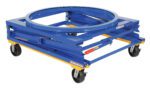 A blue and yellow industrial dolly, the Vestil Adjustable Pallet Stand Carousel Caster, has a metal ring on top and four swiveling caster wheels, featuring a sturdy metal bar framework to support heavy loads effortlessly.
