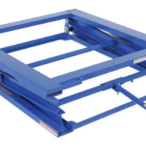 The scissor lift table, matching the Vestil Adjustable Pallet Stand 5000 Lb, features a manual hydraulic pump handle. It is collapsed, showcasing its robust metal frame and unique red-tipped handle on one side.