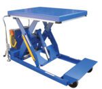 The Vestil HD Portable Scissor Lift Table 5K 47 In includes a blue hydraulic lift with a rectangular platform, four wheels, and a metal scissor-style frame, complete with hydraulic components and a side control handle.