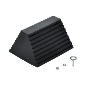A black rubber pyramidal doorstop, resembling a Vestil Serrated Bottom Rubber Wheel Chock, is shown with a keyring, nut, and washer on a plain white background.