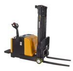 The Vestil Counter Balanced Powered Lift 2 To 118, in yellow and black, features extended forks, a vertical mast, and a control handle. Its expertly designed for lifting pallets up to 118 inches in warehouses or storage facilities.