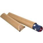 Two 4 x 24 Kraft Crimped End Tubes (15/Case) lie on a white surface; one is partially open, revealing a rolled-up fabric reminiscent of the American flag with visible white stars on a deep blue background.
