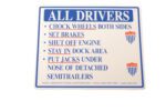 The Vestil Aluminum Driver Beware Instruction Sign provides safety instructions for drivers: Chock Wheels Both Sides, Set Brakes, Shut Off Engine, Stay in Dock Area, Put Jacks Under Nose of Detached Semitrailers and includes OSHA and Vestil Manufacturing Corporation details.