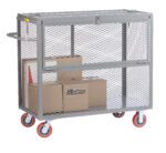 A Little Giant Security Box Truck, with a metal mesh design, red wheels, and two cardboard boxes on board, features a convenient handle and sliding top for secure storage.