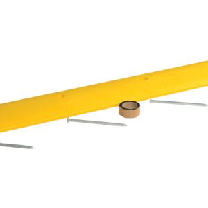 A yellow Vestil Speed Bump-Asphalt Hardware 72X12X2.25 featuring five metal spikes underneath is positioned beside a roll of tan duct tape on a white background.